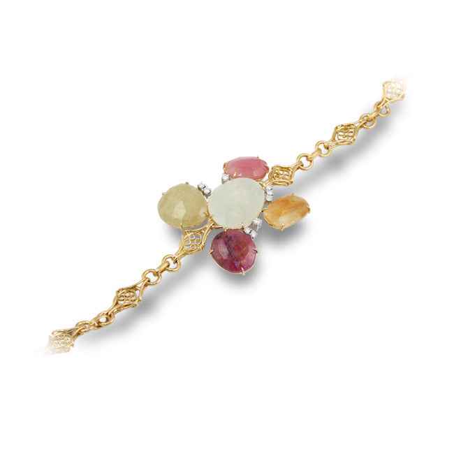 Pulsera en oro amarillo brillantes y zafiros.