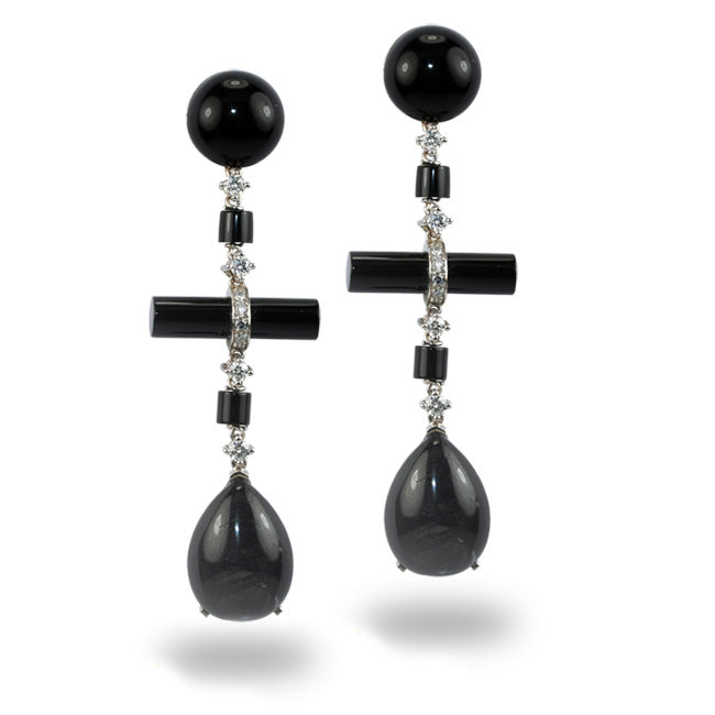 Ohrringe aus Weißgold mit Onyx und Diamanten.