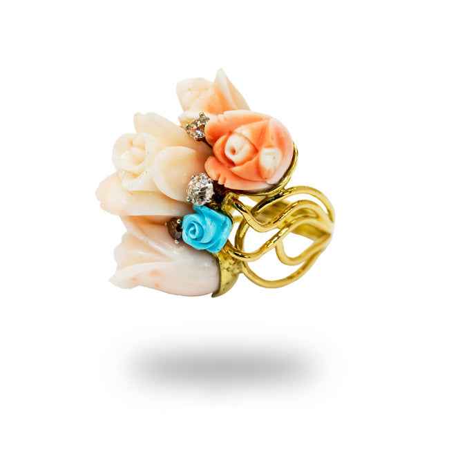 Anillo en oro amarillo con flores de coral, turquesa y brillantes