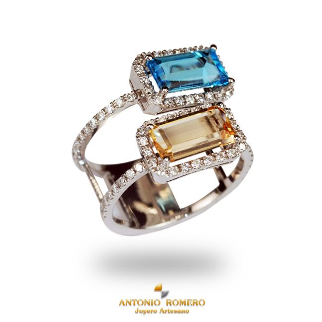 White gold ring with diamonds, blue and yellow topaz