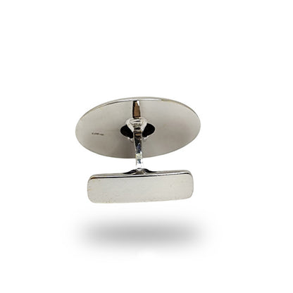 Oval cufflinks in 18 carat white gold with onyx center