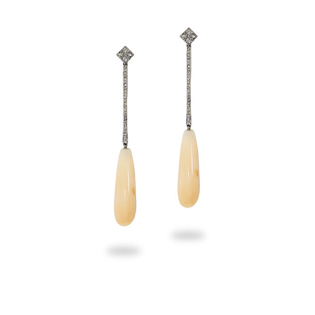 White gold earrings with diamonds and corals