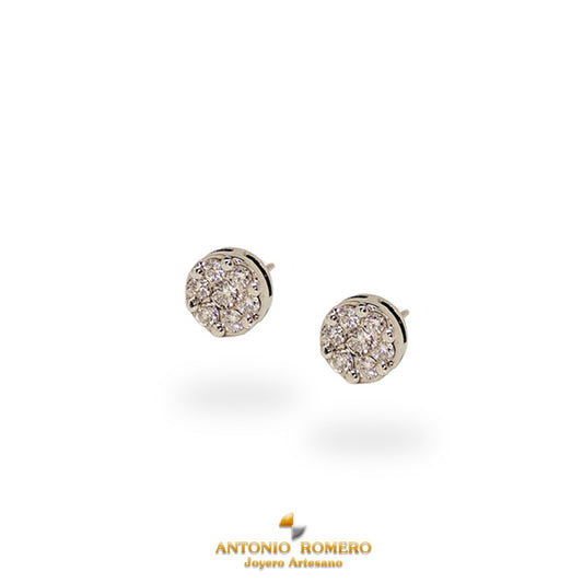 White gold earrings with diamonds centre.