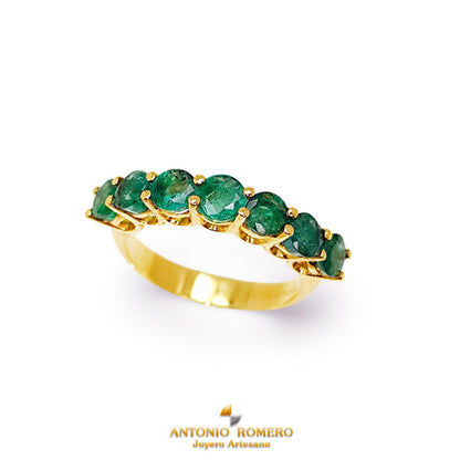 Yellow gold ring with emeralds