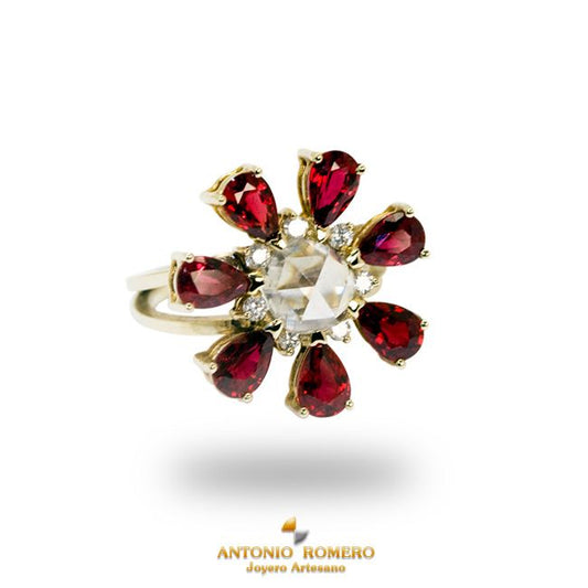 Yellow gold ring with red sapphires and central diamond